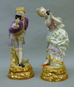 A pair of porcelain figurines. The lady 44 cm high.