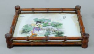 A Chinese porcelain inset tray. 34.5 cm long.