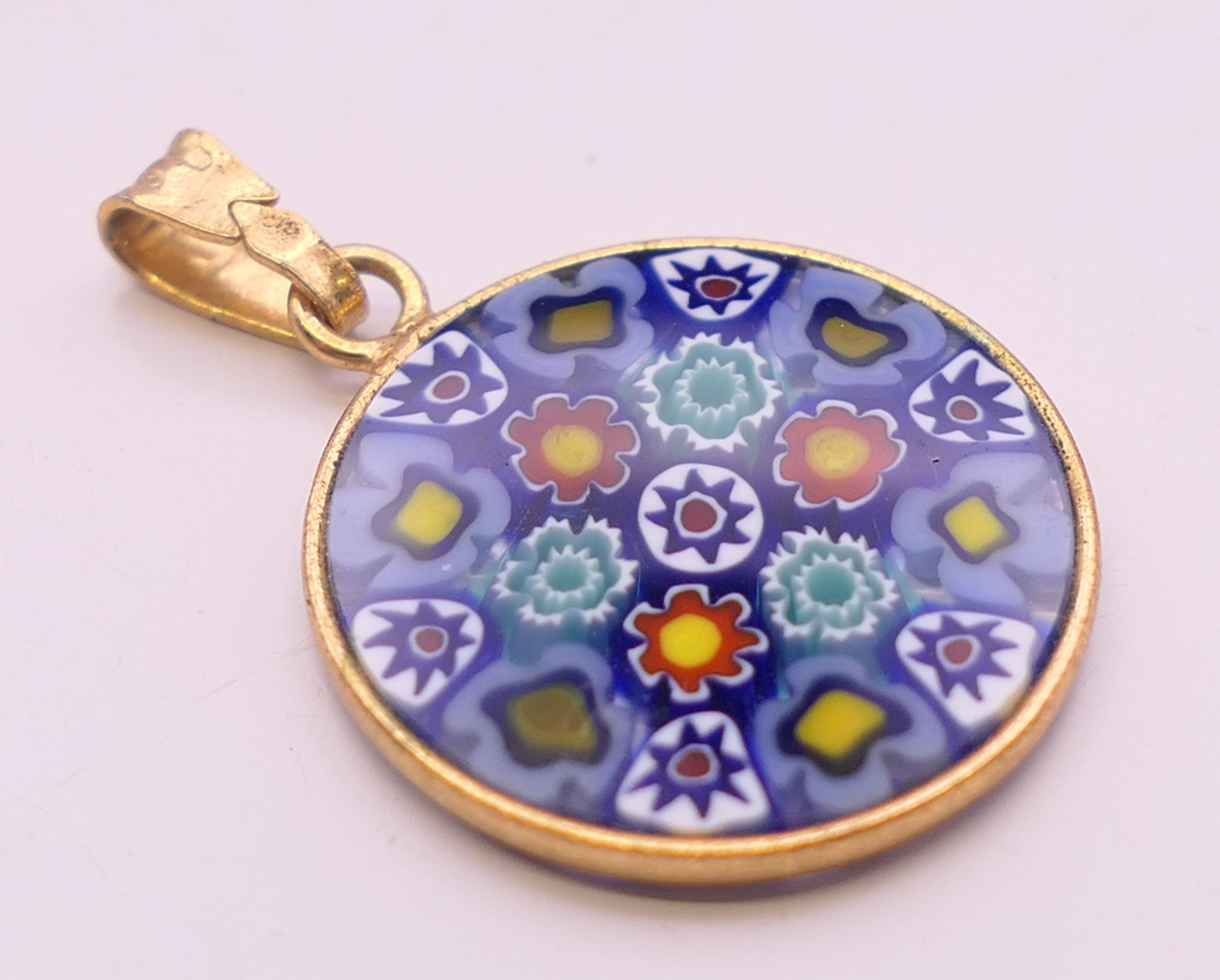 Two silver gilt Venetian millefiori glass pendants. 2.5 and 2 cm diameter respectively. - Image 3 of 8