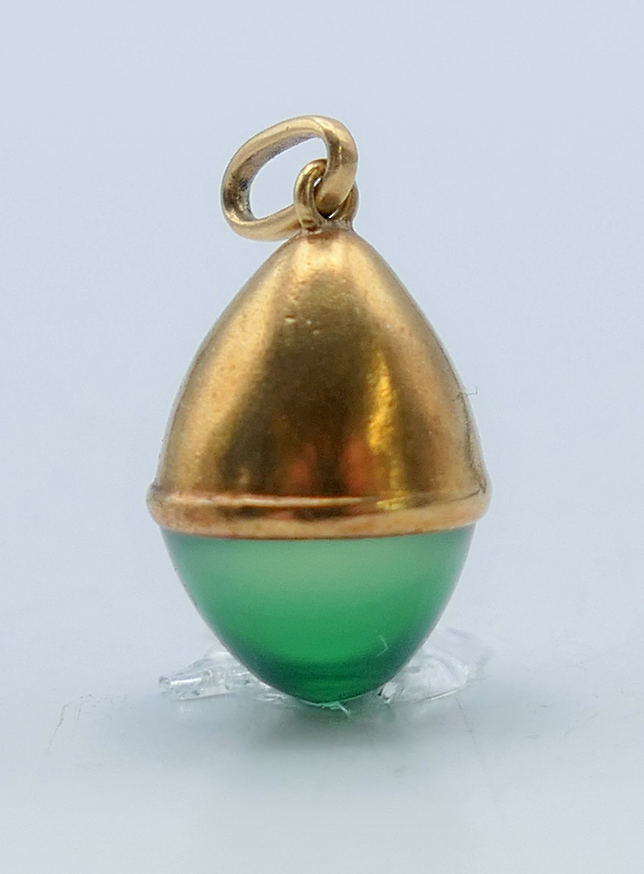 An 18 ct gold (tested) gold pendant. 1.5 cm high.