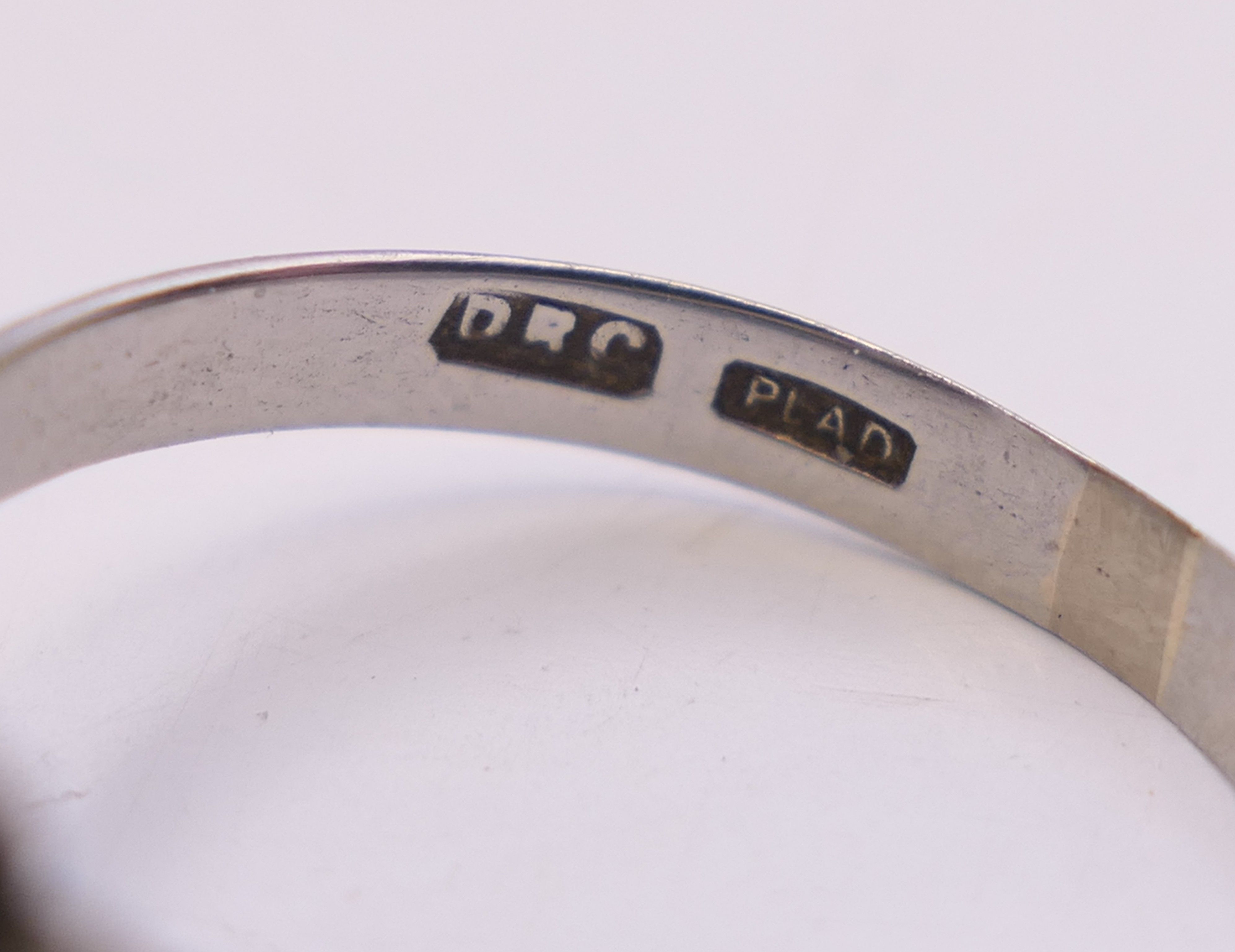 A platinum diamond and sapphire ring. Ring size H. - Image 3 of 8
