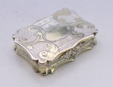 A Victorian silver gilt vinaigrette. 4 cm x 2.75 cm.