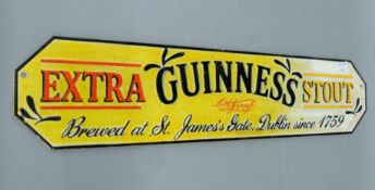 A cast iron 'Guinness' sign. 56.5 cm wide.