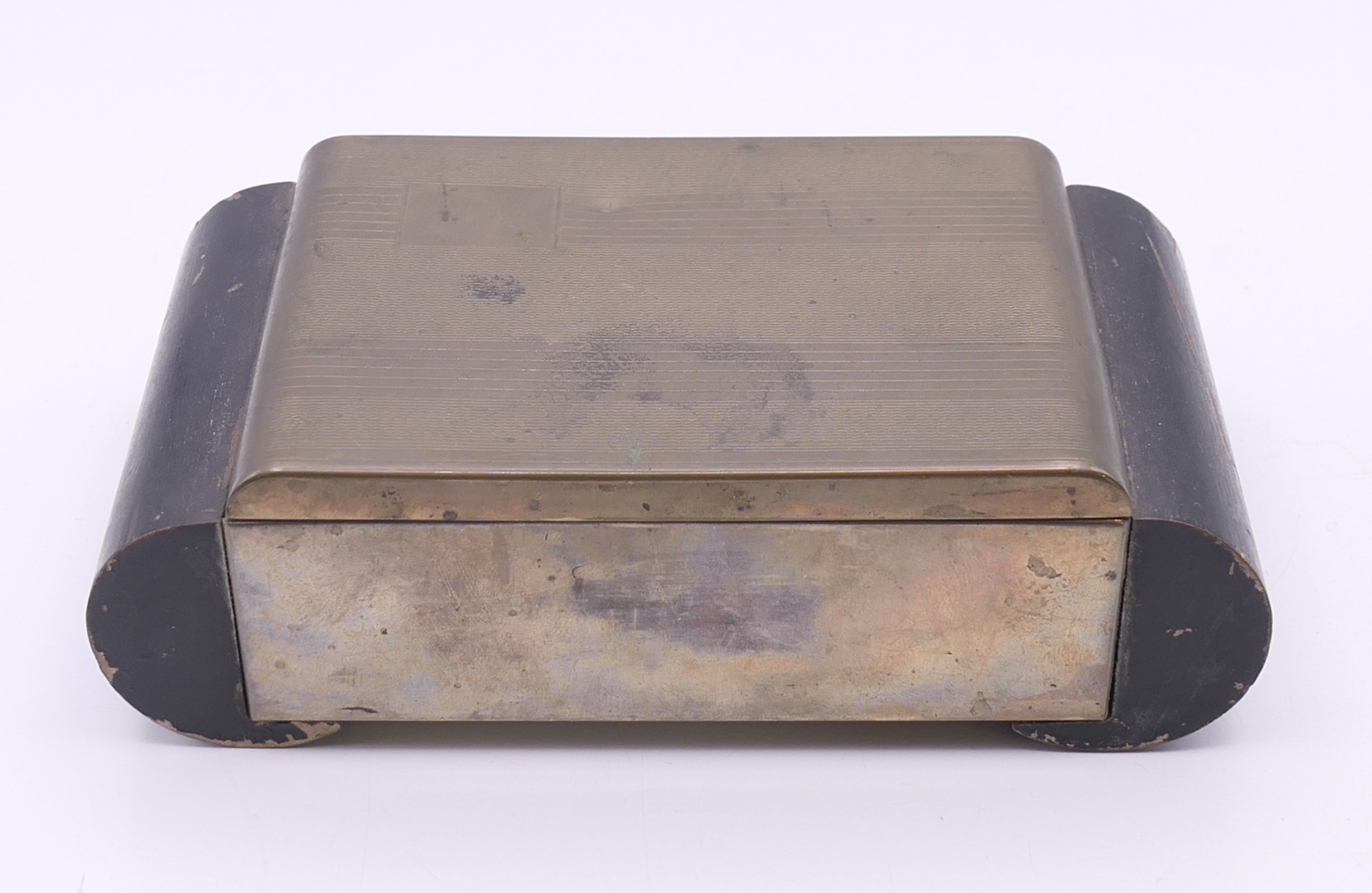 An Art Deco metal and wood cigarette box containing a quantity of coins. Box 15.5 x 8.25 x 4.5 cm. - Image 2 of 16