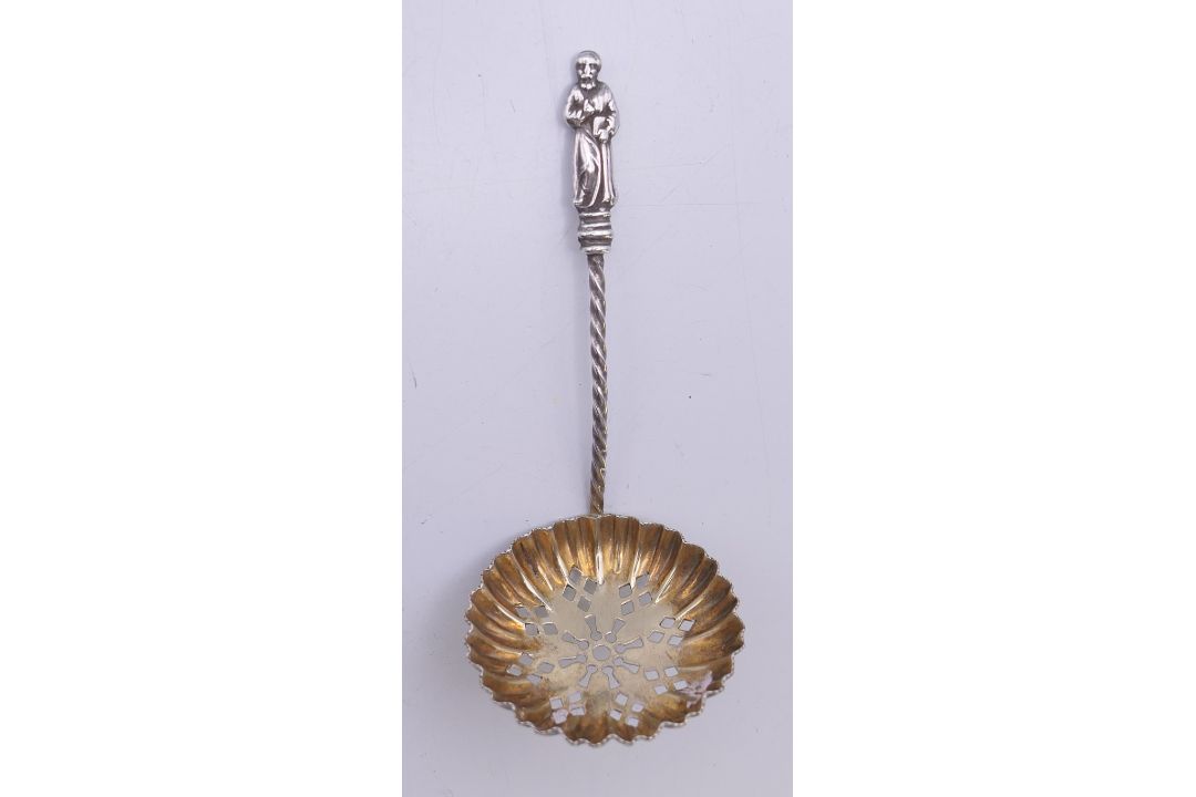 A Victorian silver gilt apostle sifter spoon. 9.5 cm high. - Image 1 of 4