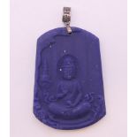 A Chinese silver-topped seated Buddha pendant. 5 cm high.