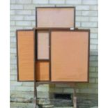A 19th century mahogany fire screen on splay legs with three sliding panels. 54 cm wide.