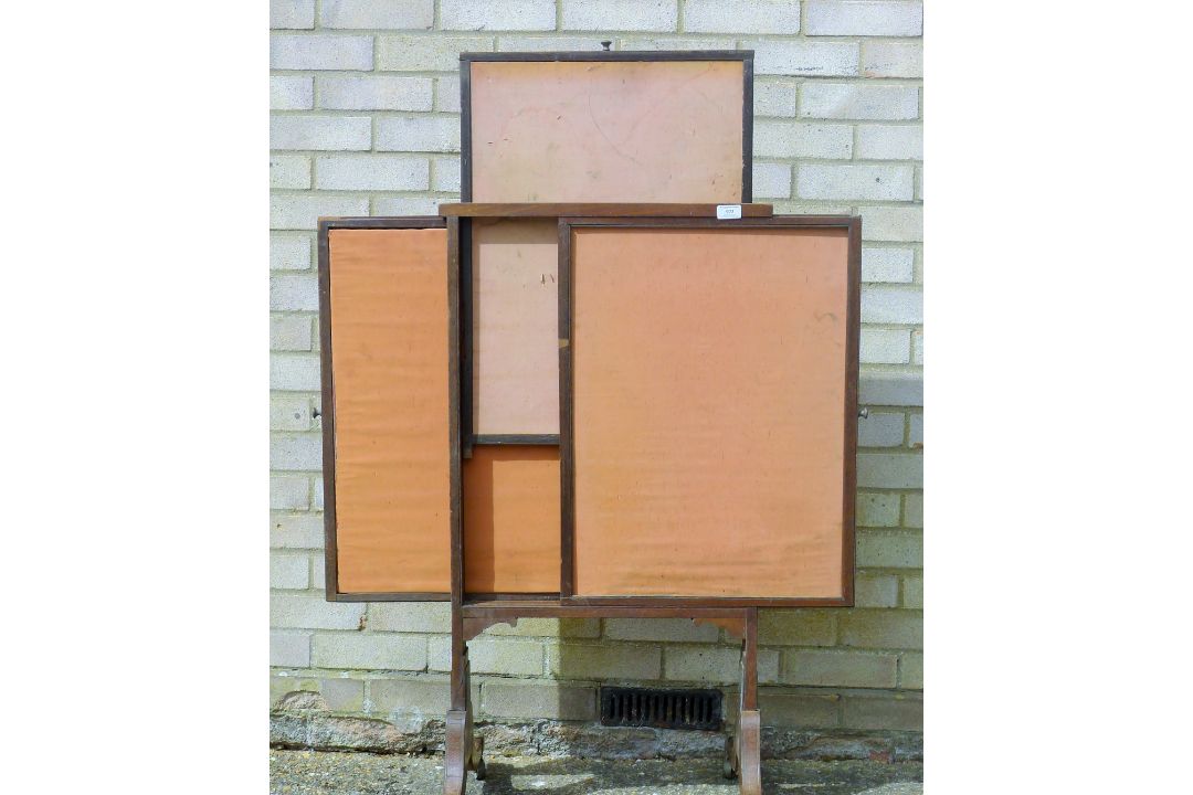 A 19th century mahogany fire screen on splay legs with three sliding panels. 54 cm wide. - Image 1 of 5