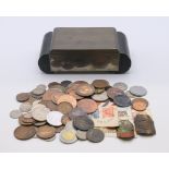 An Art Deco metal and wood cigarette box containing a quantity of coins. Box 15.5 x 8.25 x 4.5 cm.