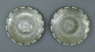 Two metal coin dishes. 9 cm diameter.