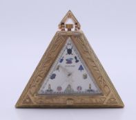 A silver gilt Masonic type pocket watch. 5 cm high.