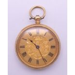 A 18 K gold Camerer Cuss & Co fob watch. 3.5 cm diameter. 29.3 grammes total weight.