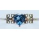A silver bangle with heart shaped blue stone. Heart 1.5 cm high. - Image 1 of 6