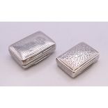 Two Georgian silver vinaigrettes. The larger 3.5 x 2.75 cm.