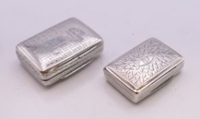 Two Georgian silver vinaigrettes. The larger 3.5 x 2.75 cm.