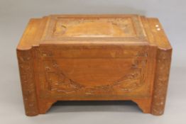 An Eastern camphor wood trunk. 100 cm wide.
