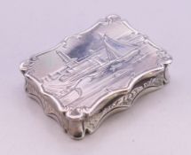 A Nathaniel Mills Victorian silver vinaigrette engraved with a harbour scene. 4.25 x 3 cm.