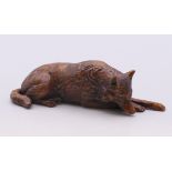 A model of a wolf/dog. 10.25 cm long.