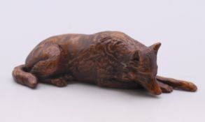 A model of a wolf/dog. 10.25 cm long.
