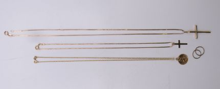Two 9 ct gold cross pendants on 9 ct gold chains,