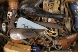 A collection of vintage bottle openers, toffee hammers etc. The largest toffee hammer 19 cm long.