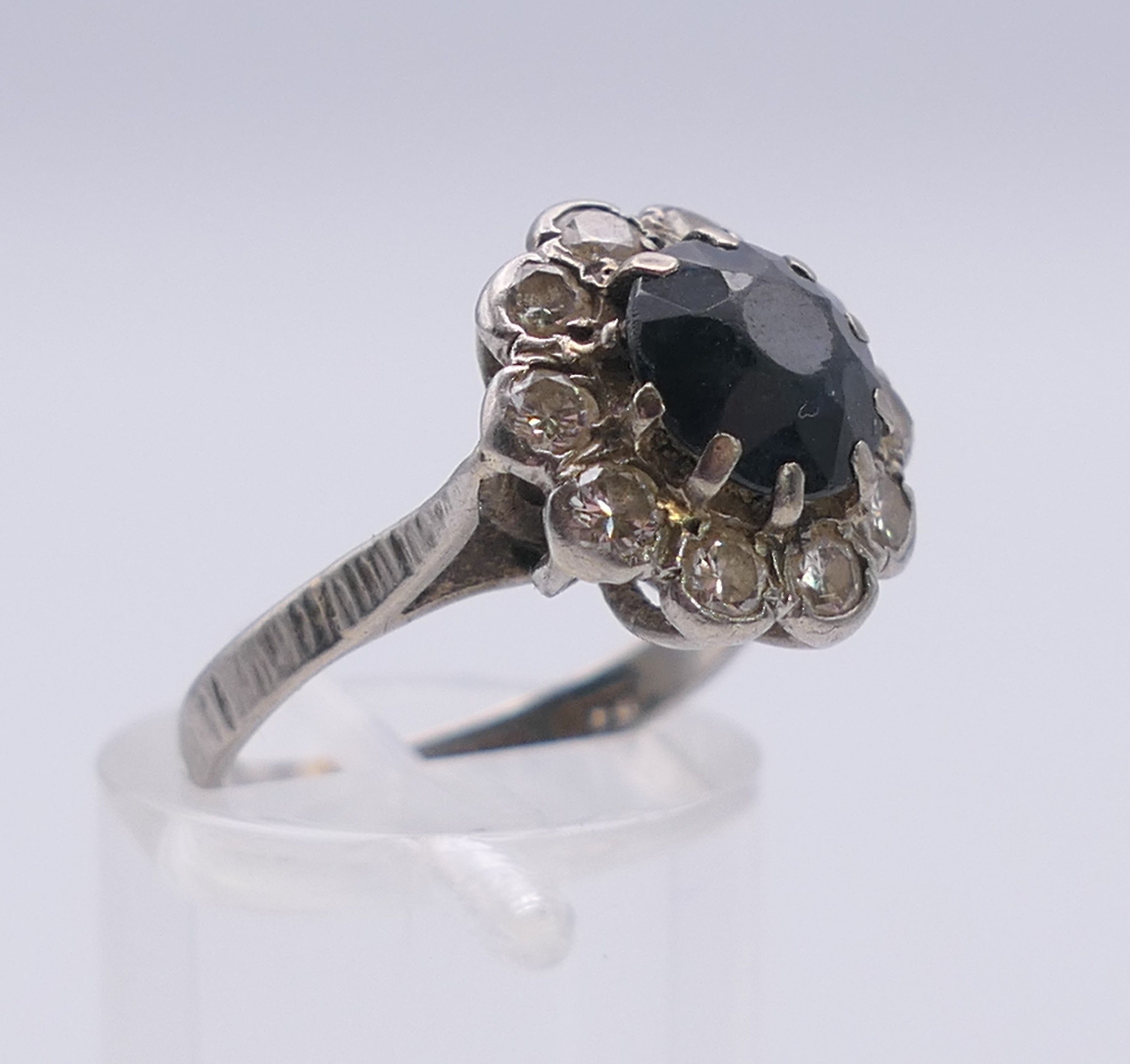 A platinum diamond and sapphire ring. Ring size H. - Image 2 of 8
