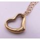 A 9 ct gold heart shaped pendant on a 9 ct gold fine chain. Pendant 1 cm x 1 cm, chain 42 cm long. - Image 4 of 9