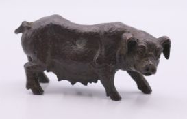 A small bronze pig. 3.5 cm high.