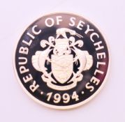 A 1994 Seychelles 25 rupees silver proof coin with certificate.