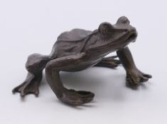 A bronze frog. 3 cm high.