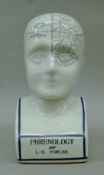 A porcelain phrenology head. 29.5 cm high.