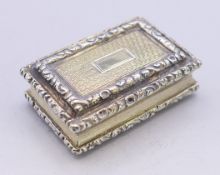 A Nathaniel Mills silver gilt vinaigrette. 3.5 cm x 2.5 cm.