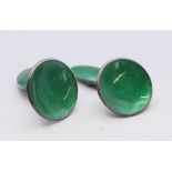 A pair of Norwegian silver and green enamel cufflinks. 1.75 cm diameter.
