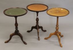 Three tripod wine tables. Each approximately 51 cm high.