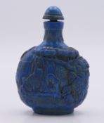 A Chinese snuff bottle and stopper. 8.5 cm high.