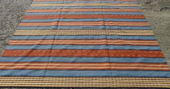 A modern kelim rug (Navaho-design). 305 x 244 cm.