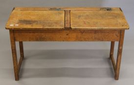 An vintage double school desk. 102 cm wide x 58 cm high.