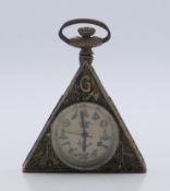 A brass Masonic type pocket watch. 6 cm high.