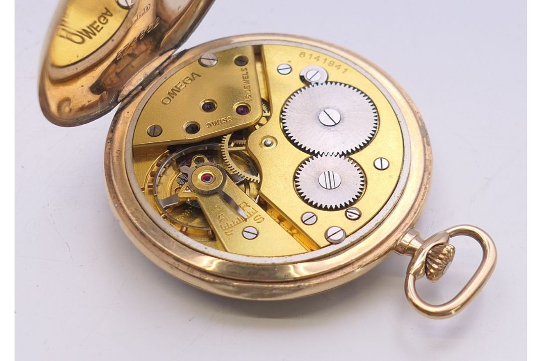 A 9 ct gold Omega open face pocket watch. 4.5 cm diameter. 63 grammes total weight. - Image 5 of 8