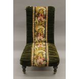 A Victorian tapestry-covered nursing chair. 56 cm wide.