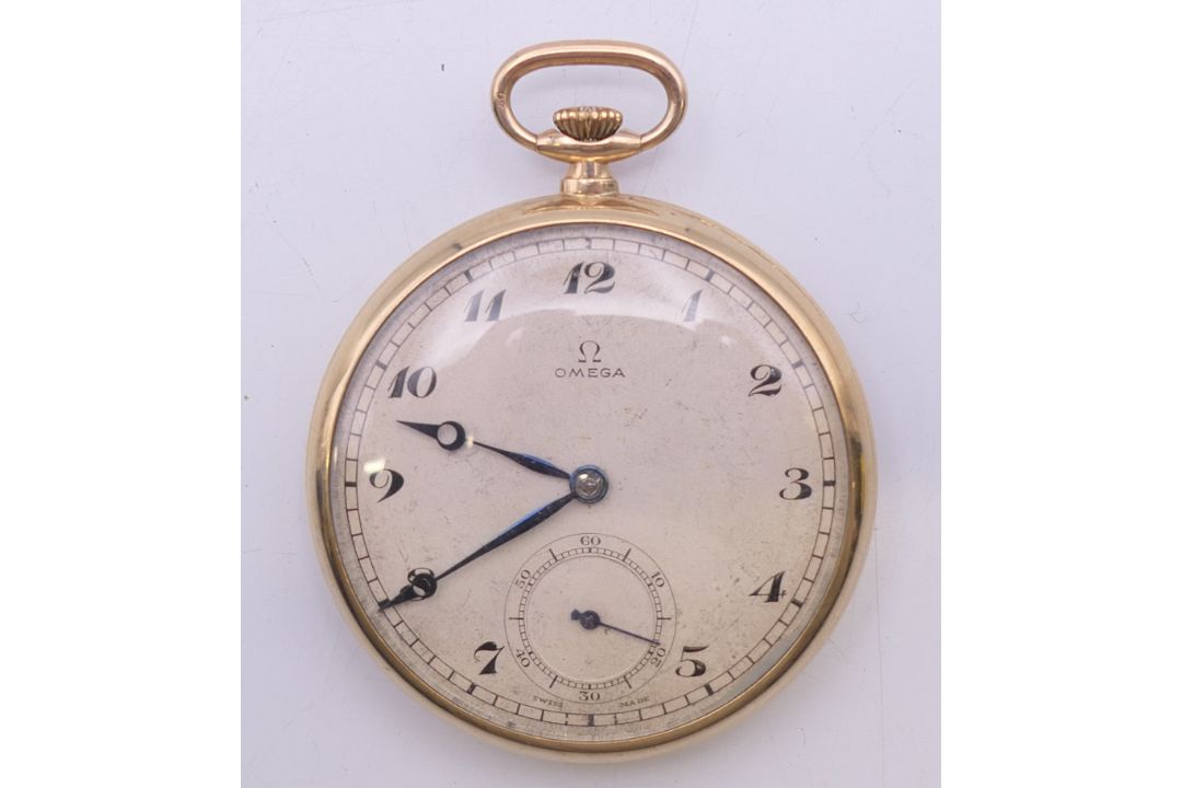 A 9 ct gold Omega open face pocket watch. 4.5 cm diameter. 63 grammes total weight. - Image 1 of 8