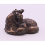 A small bronze of a fox and pup. 2.5 cm high.