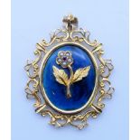 A 9 ct gold and pearl forget-me-not mourning pendant. 4 cm high. 9.8 grammes total weight.