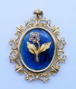 A 9 ct gold and pearl forget-me-not mourning pendant. 4 cm high. 9.8 grammes total weight.