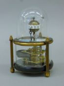 A fish clock. 14.5 cm high.