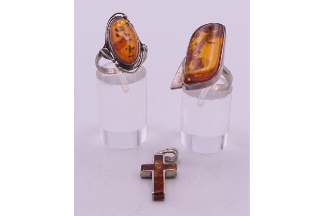 Two silver and amber rings and a cross pendant. Pendant 2.5 cm high. - Image 1 of 10