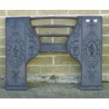 An 18th century cast iron fire front piece, marked Carron.