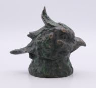A cold-painted bronze parrot inkwell. 8 cm high.