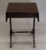 A small Edwardian line-inlaid mahogany sofa table. 53 cm wide flaps down.
