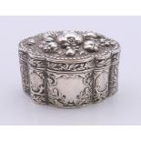 A Continental embossed silver box. 94.8 grammes. 4 cm high.